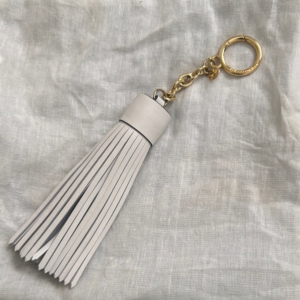 Michael Kors Elegant White Tassel Keychain